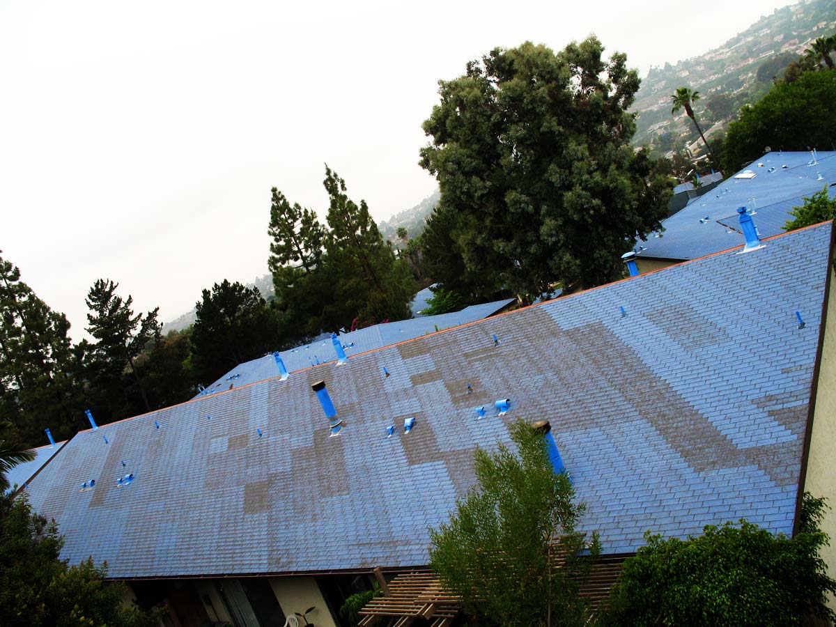 a roof of a house that has been painted blue