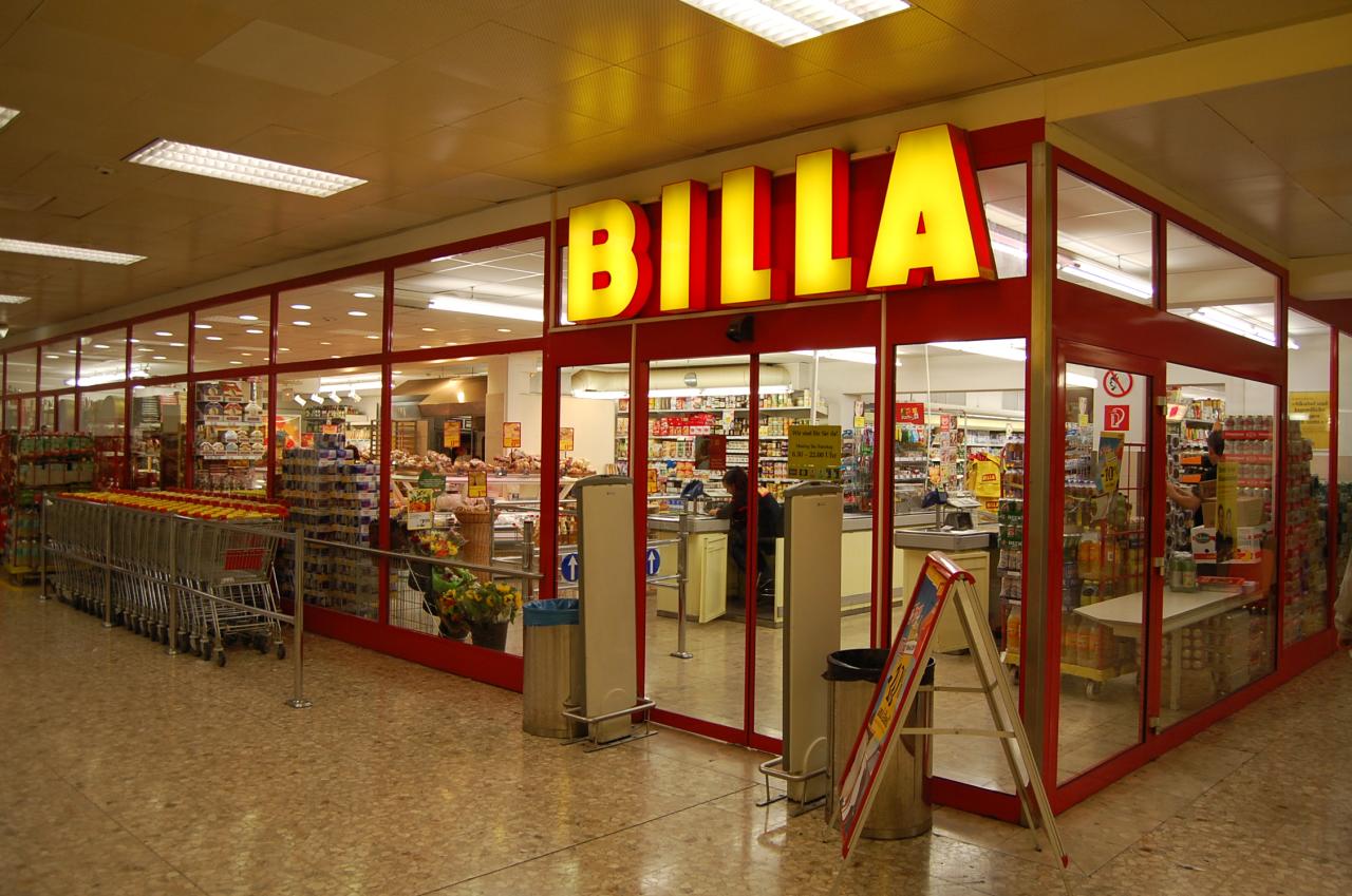 a store with no customers inside and red and yellow signage