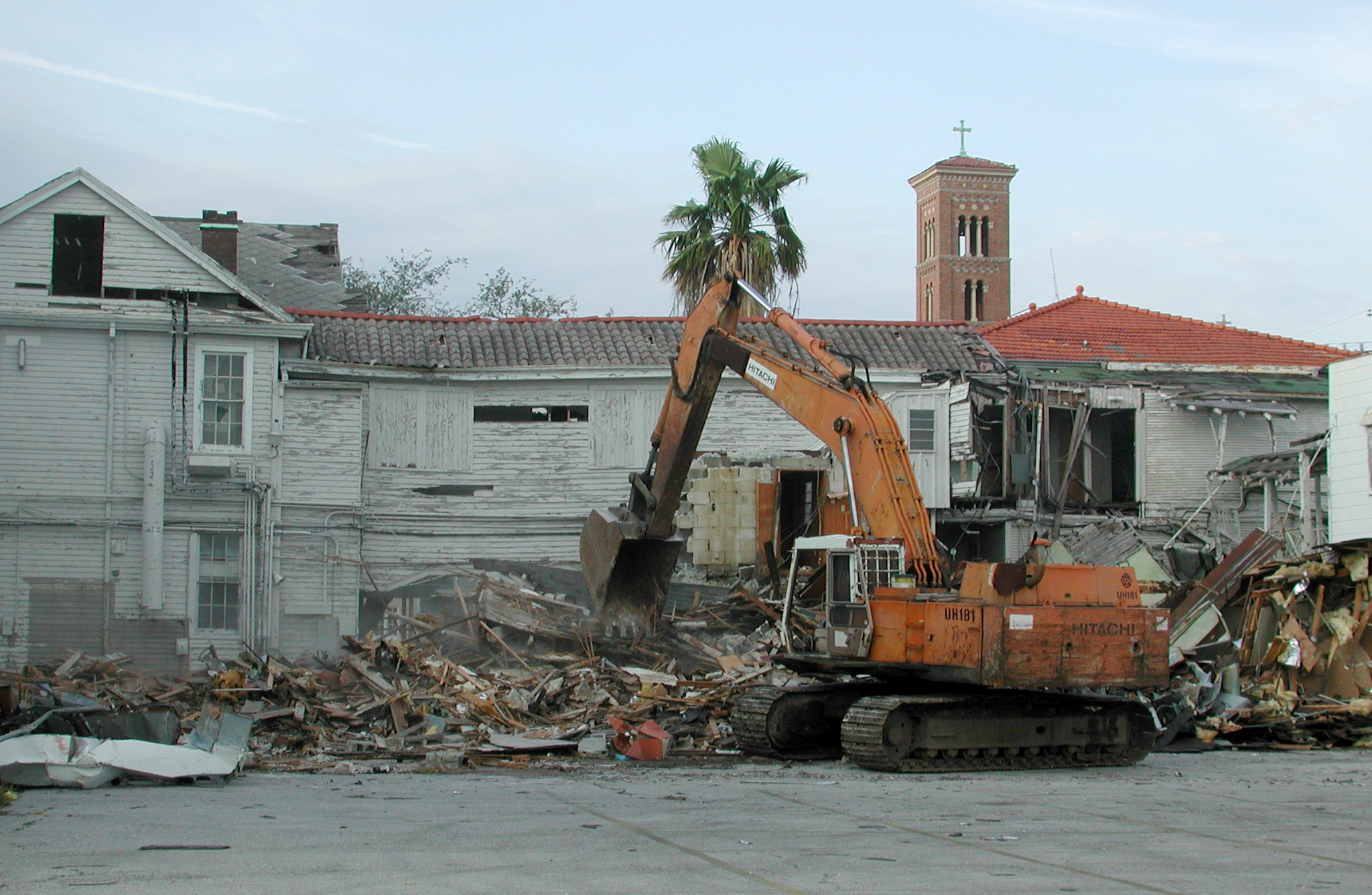 a couple of large machinery machines near buildings