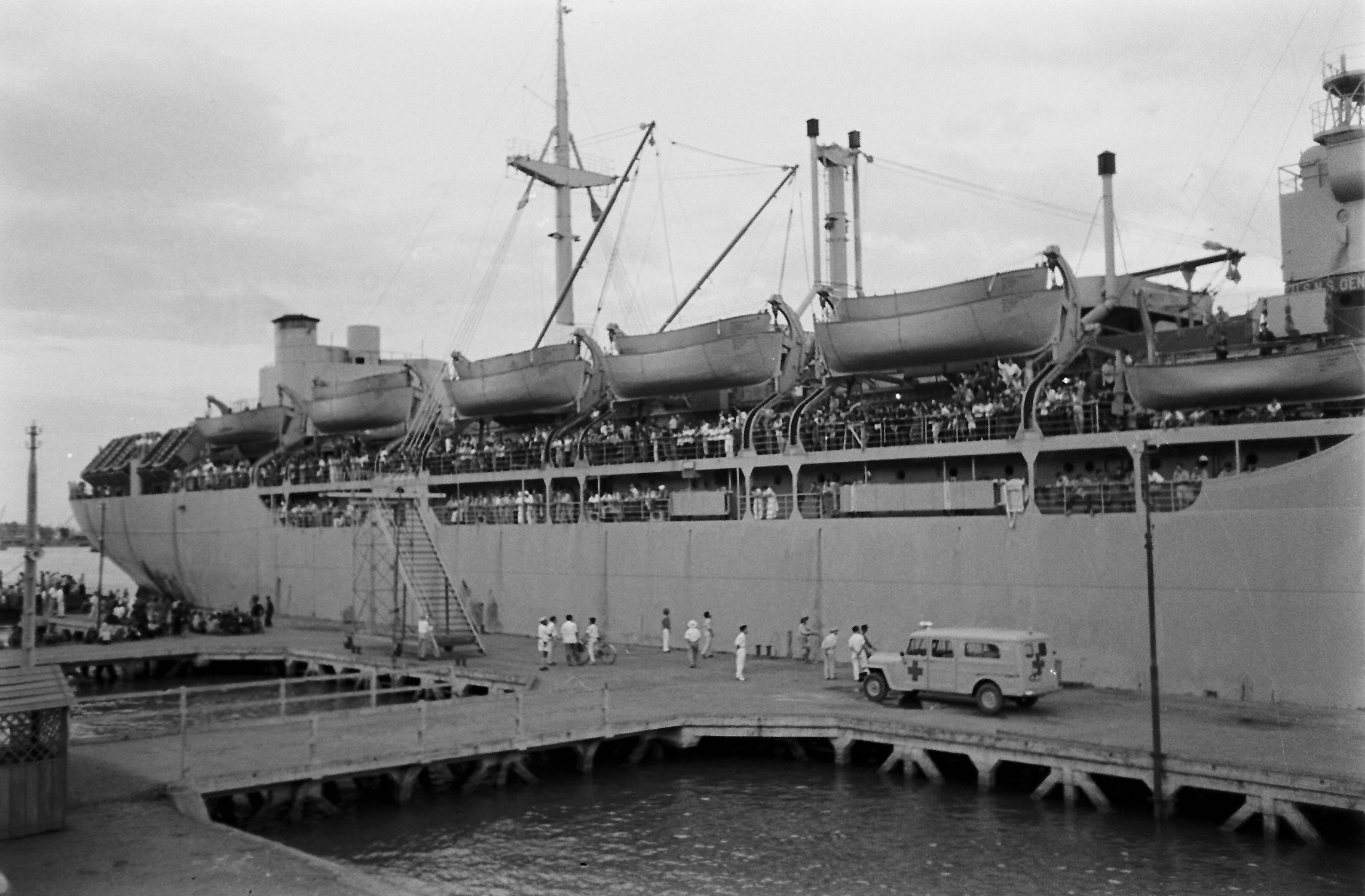 a ship that is in the water by some pier