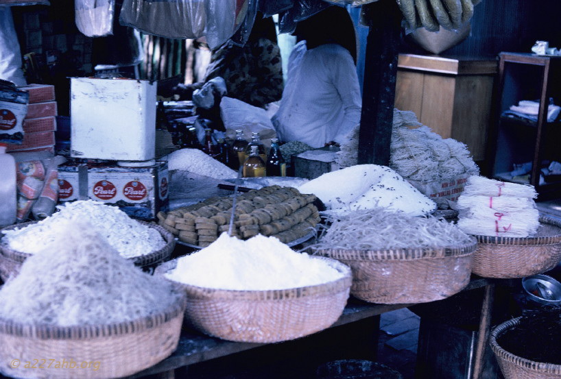 various bowls and baskets of white powder and other goods