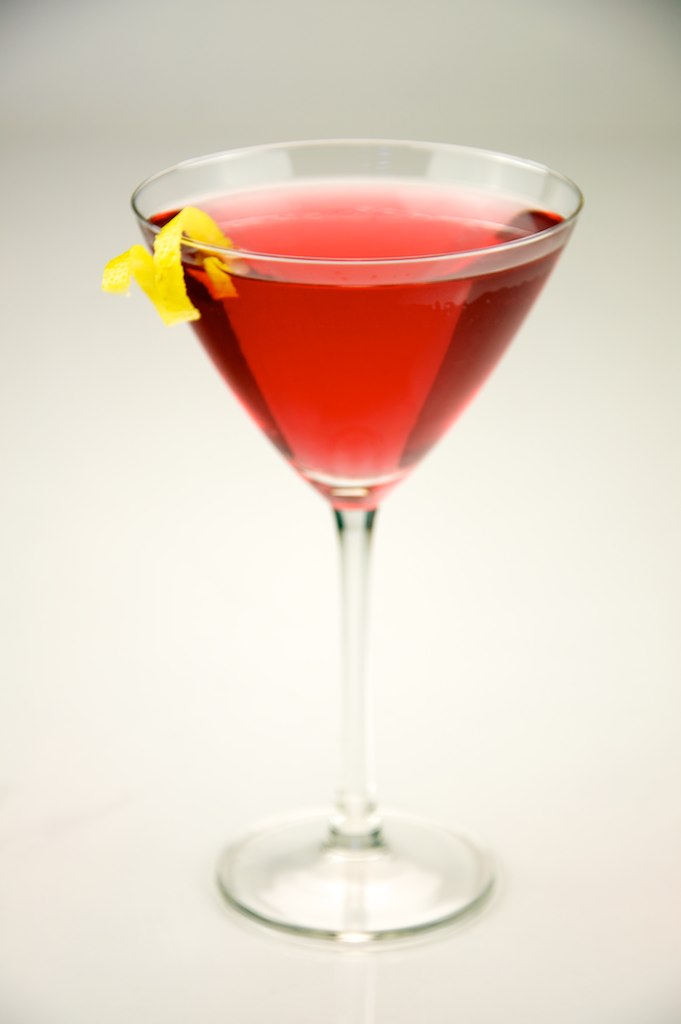 a martini with pink wine and fruit