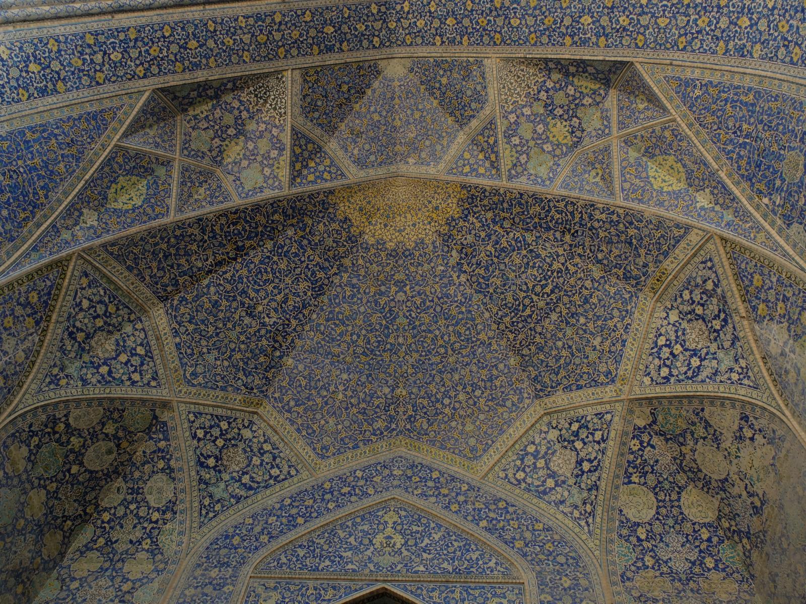 a blue decorative stone and mosaic design at the entrance to the great mosque