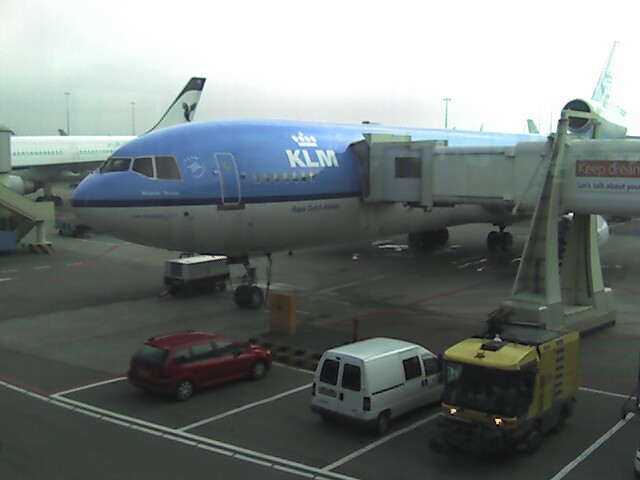 large jetliner sitting on top of an airport tarmac