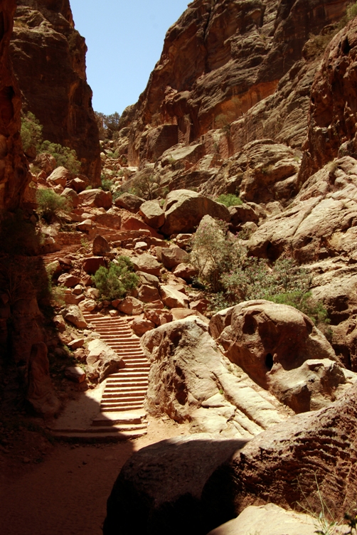steps leading uphill to an outdoor space in the desert