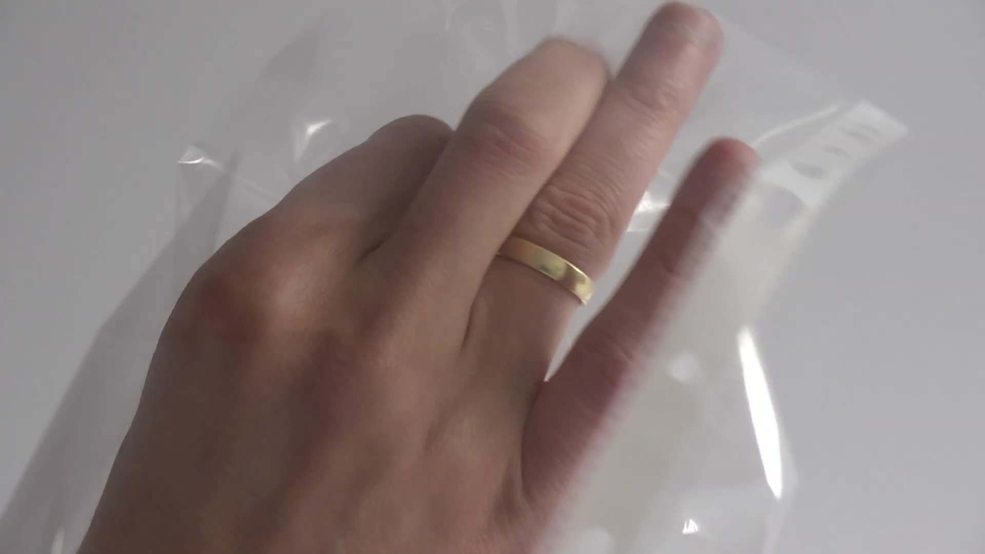 a hand is shown with a ring that matches it