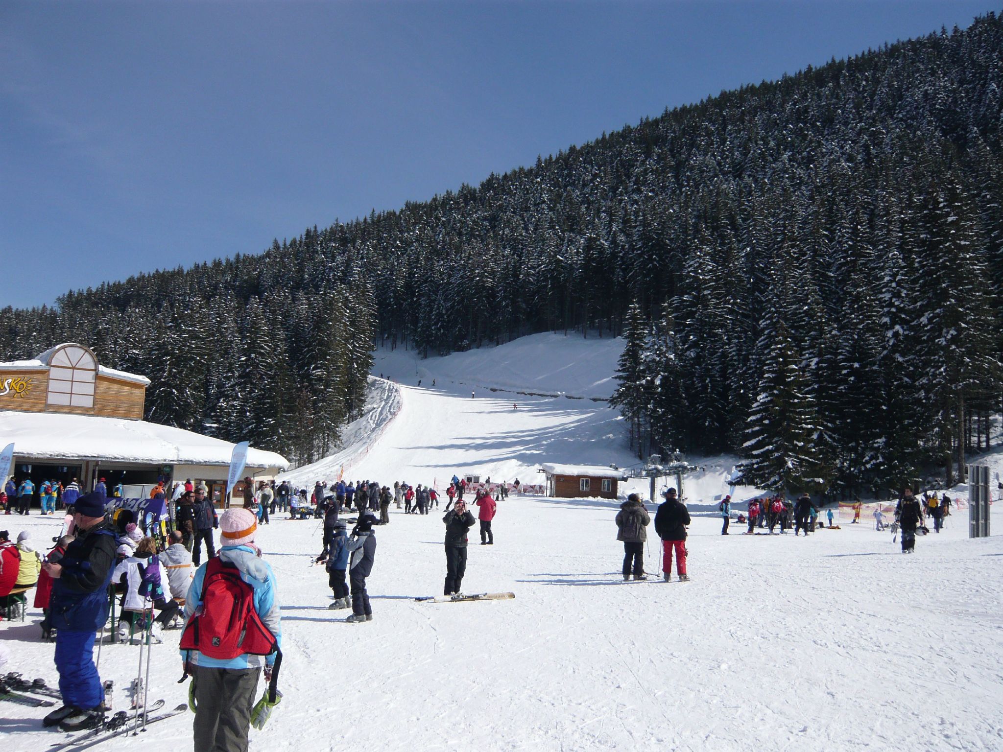 a large group of people in a ski area
