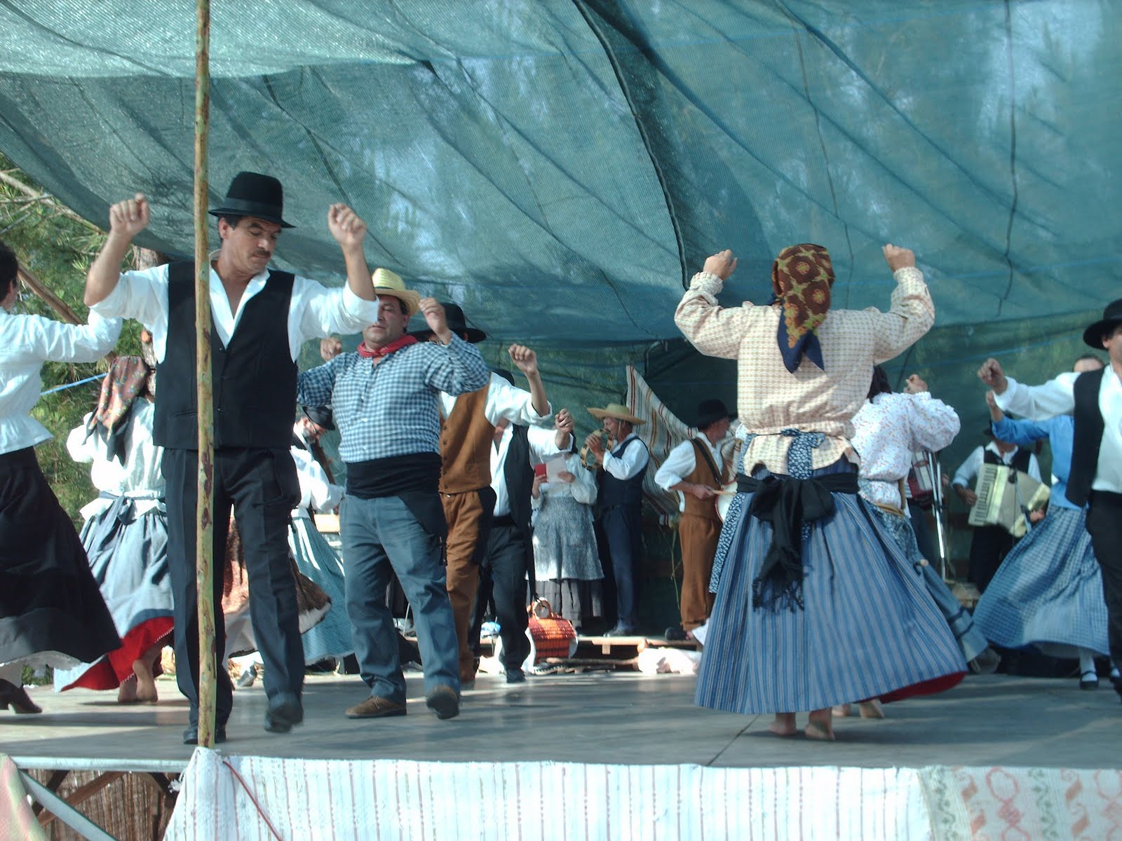 an image of men and women on a stage