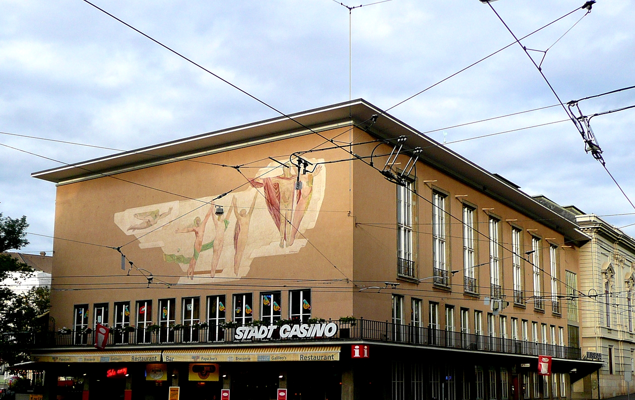 an old building has a very large map painted on the side