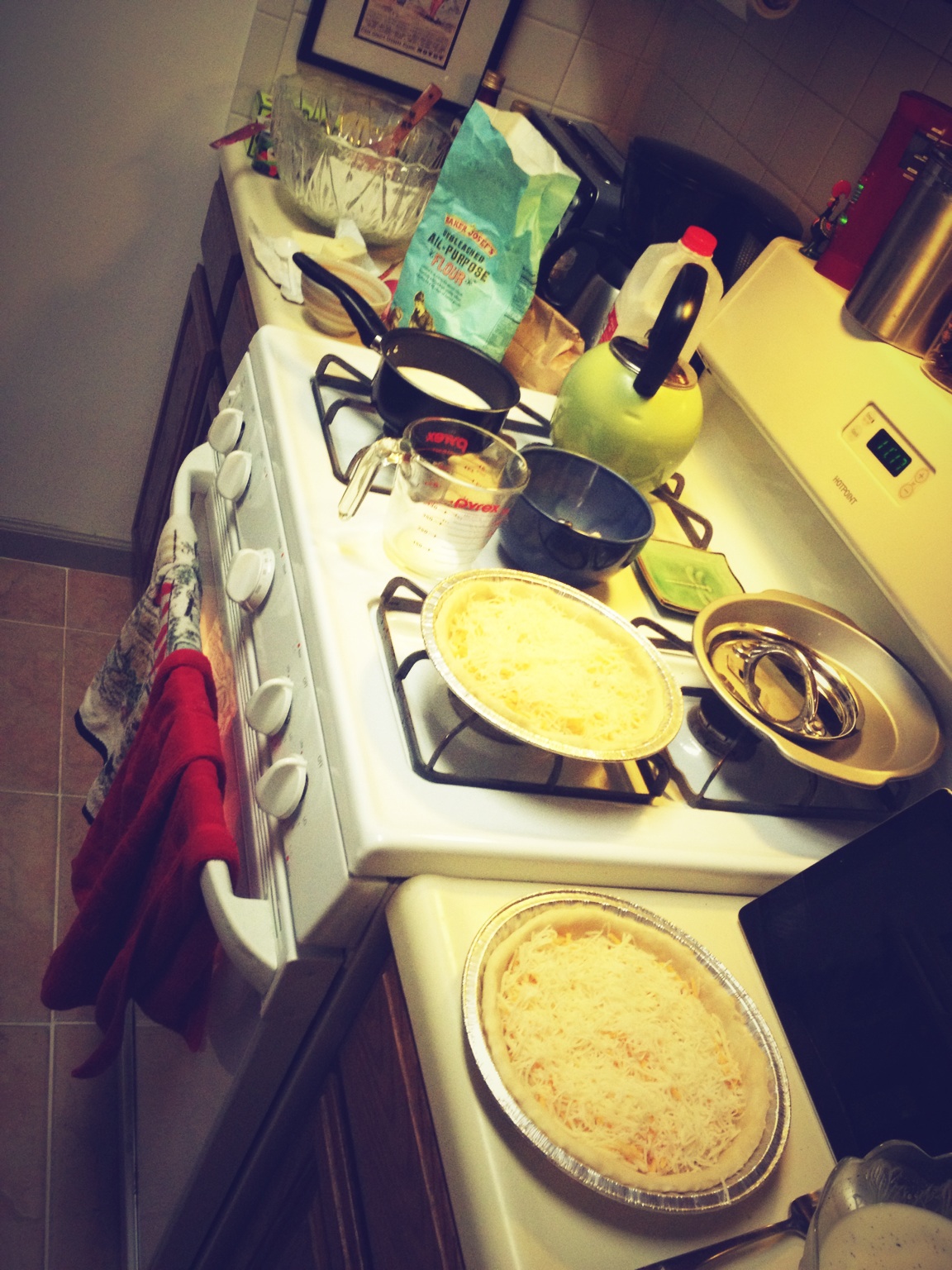 a kitchen counter with plates of food on the counter