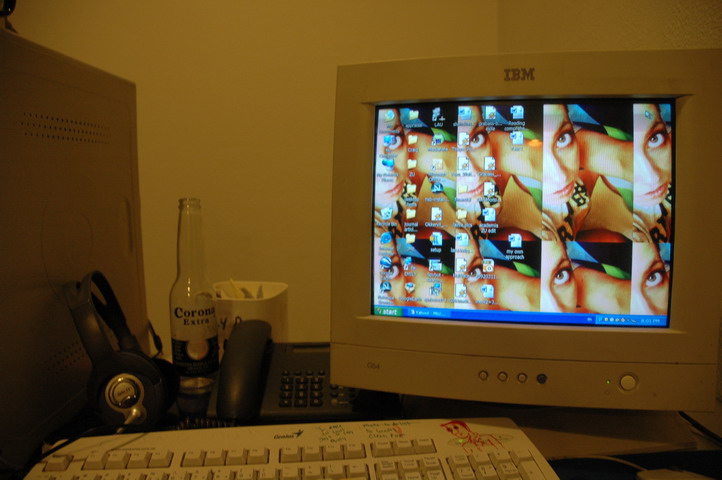 a small desktop computer and monitor sitting on a desk
