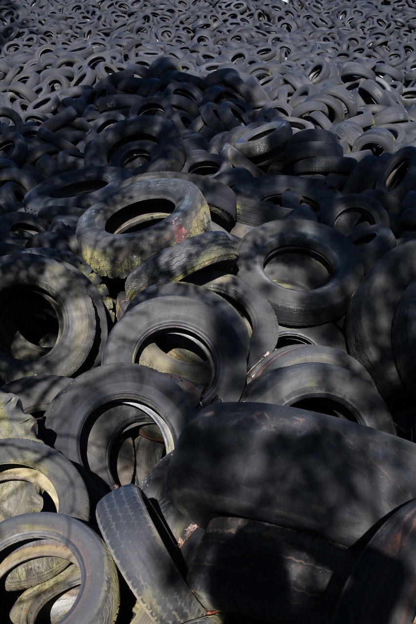 old tire stacks that are laying near each other