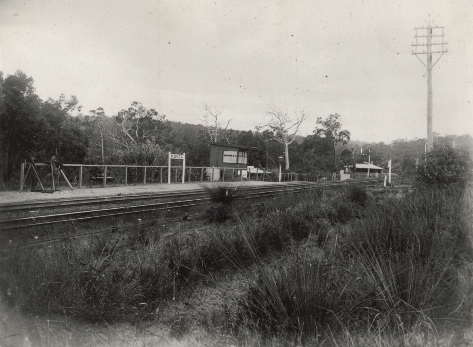 this is a vintage black and white pograph of a train station