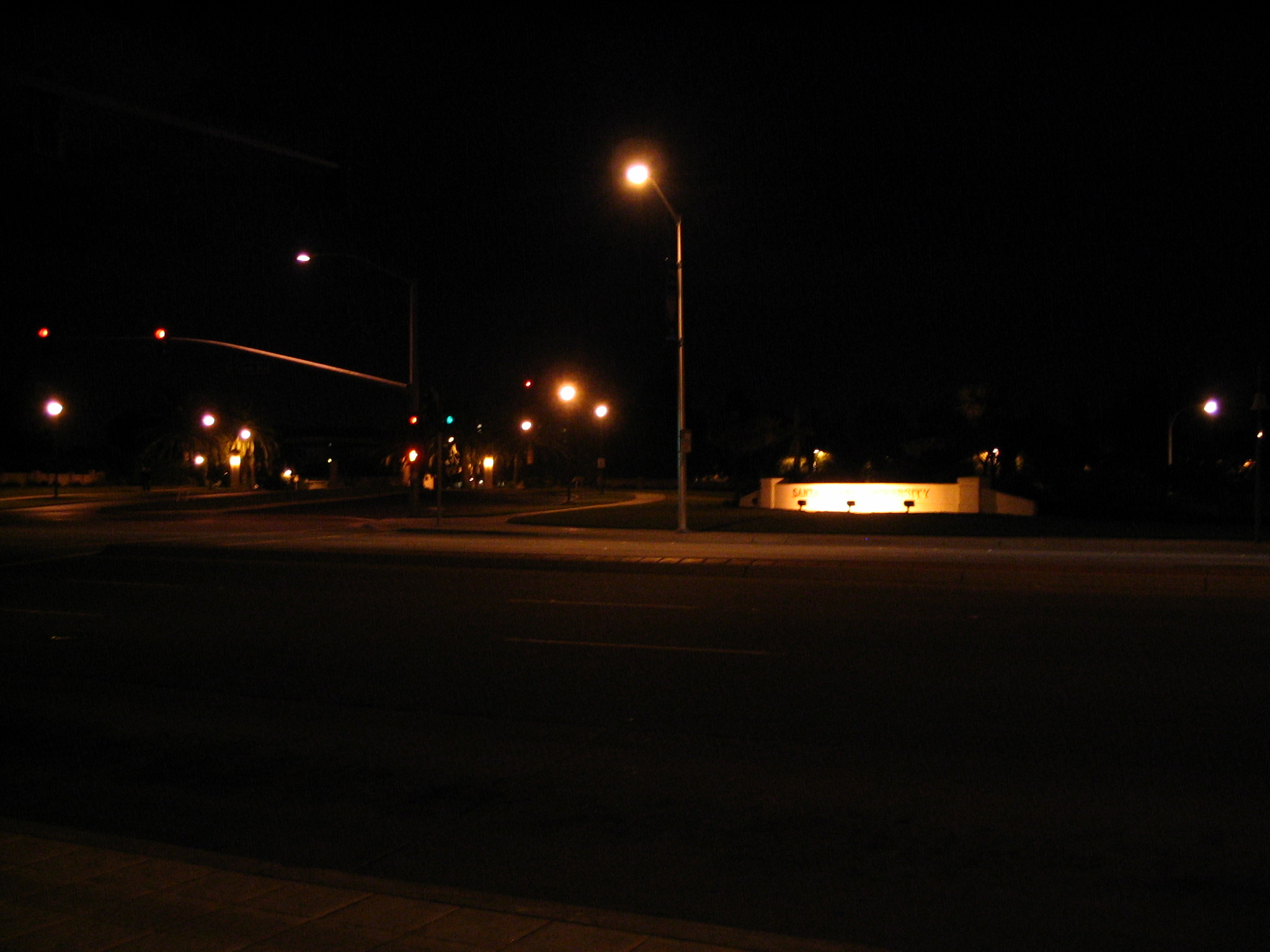 a street at night, with the light turned on