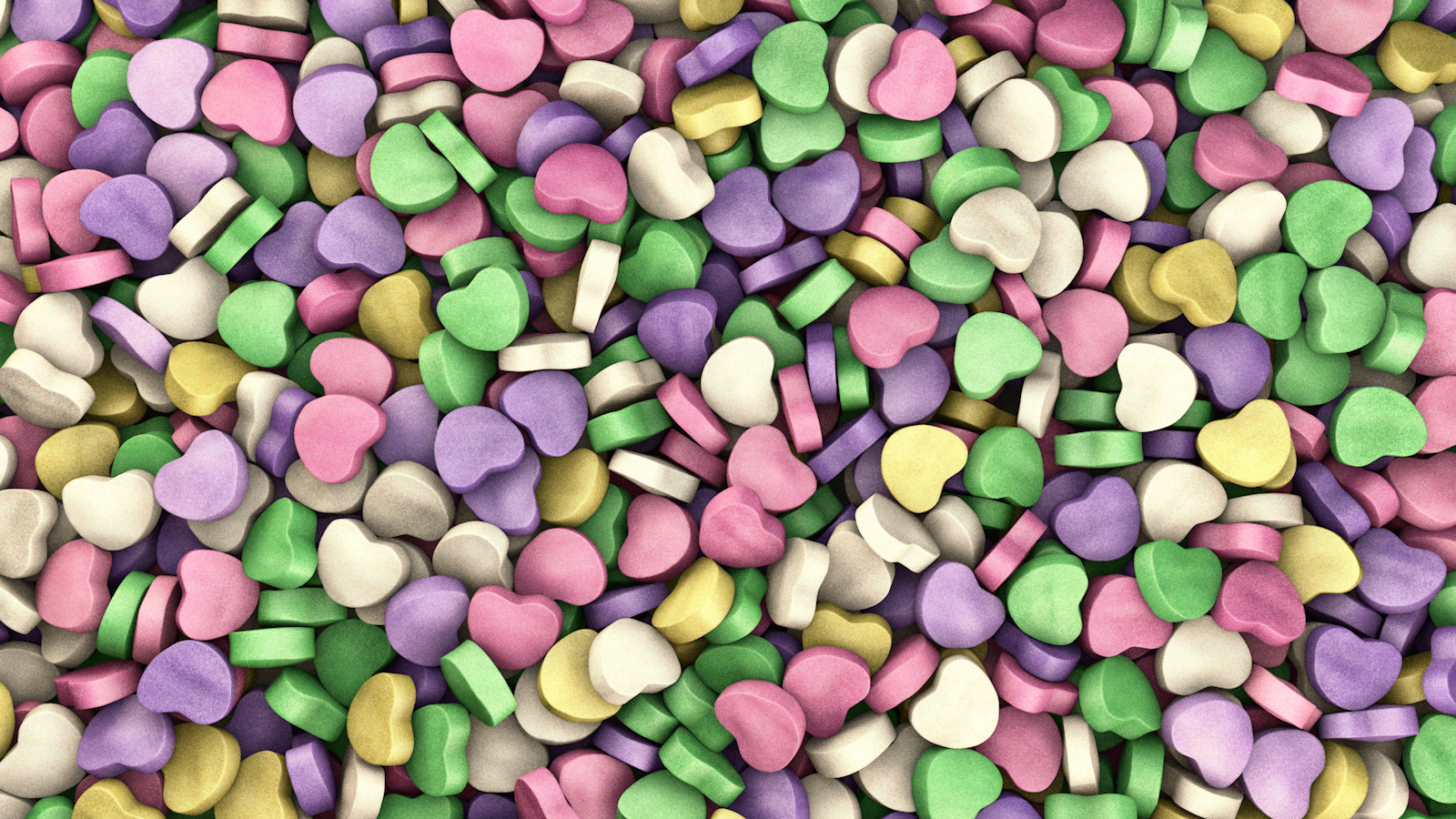 colorful candies all over a white background