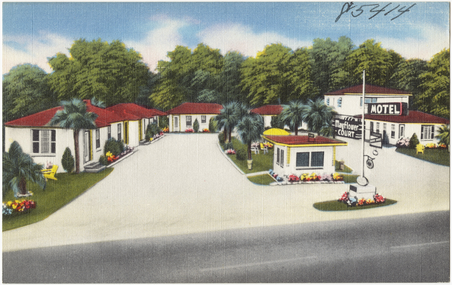 this is an old postcard depicting the front of a motel