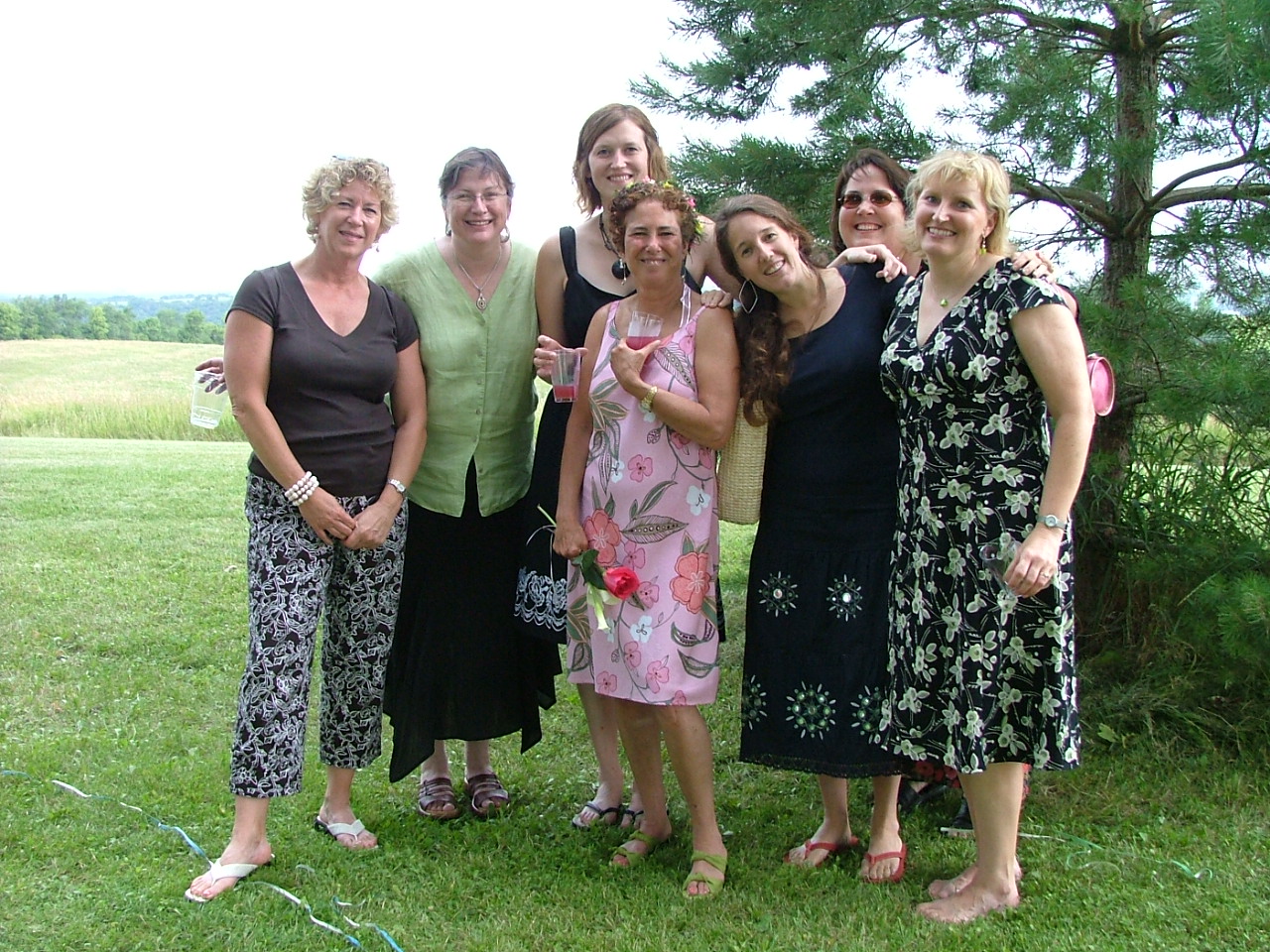 a group of women pose for a picture