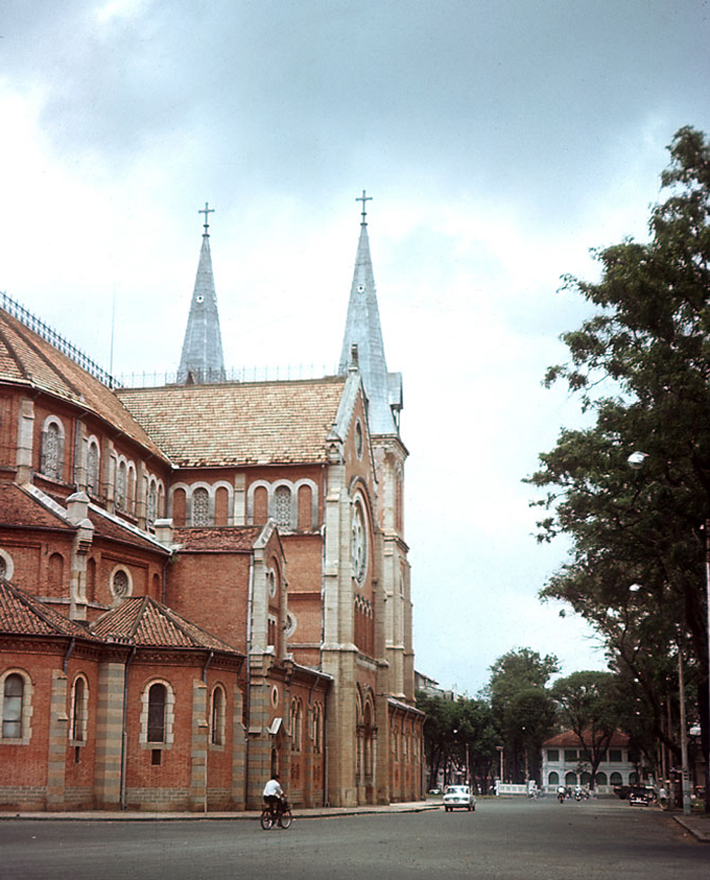 an old brick church with large towers on both sides