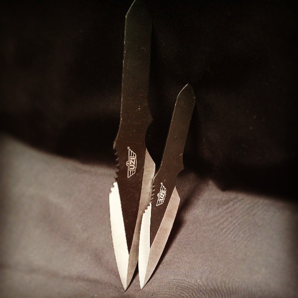 a pair of scissors resting on a cloth