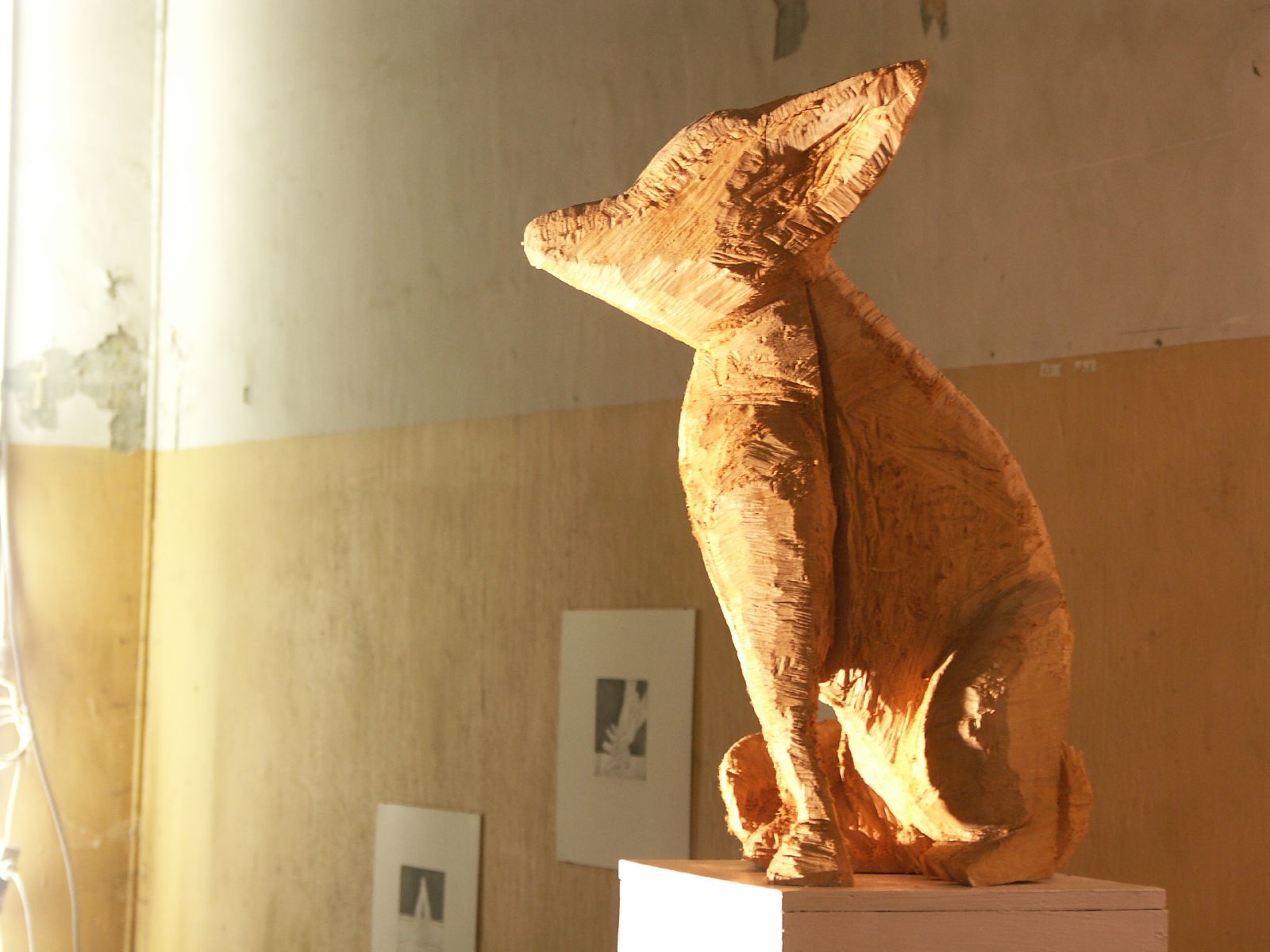 a small sculpture of a dog is shown