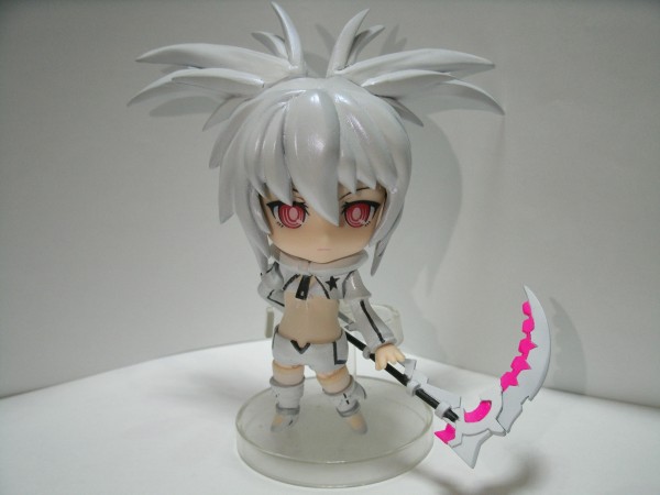 the white haired doll has an anime style haircut