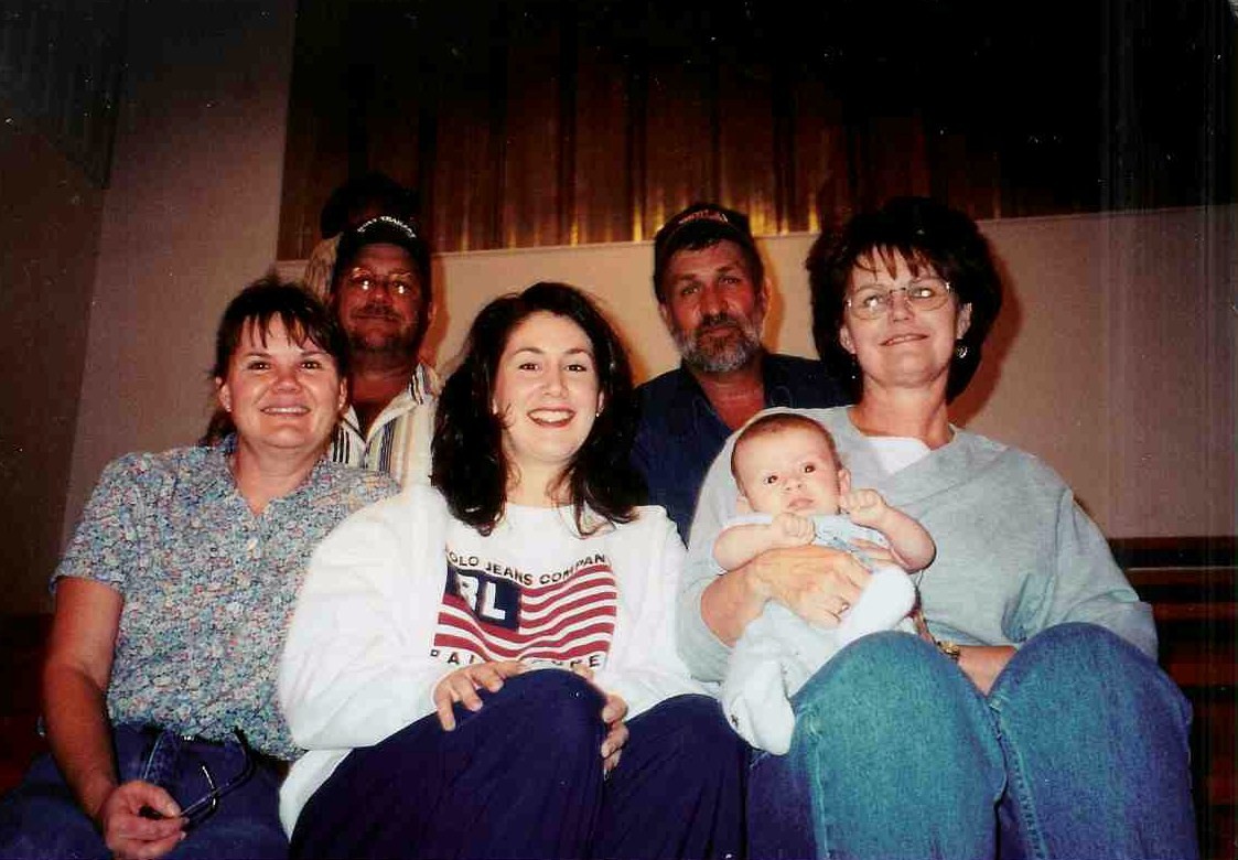 a group of people pose for a picture