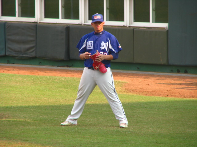 man with baseball glove during game on field
