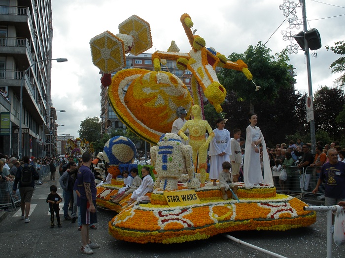 a float is full of people and decorations