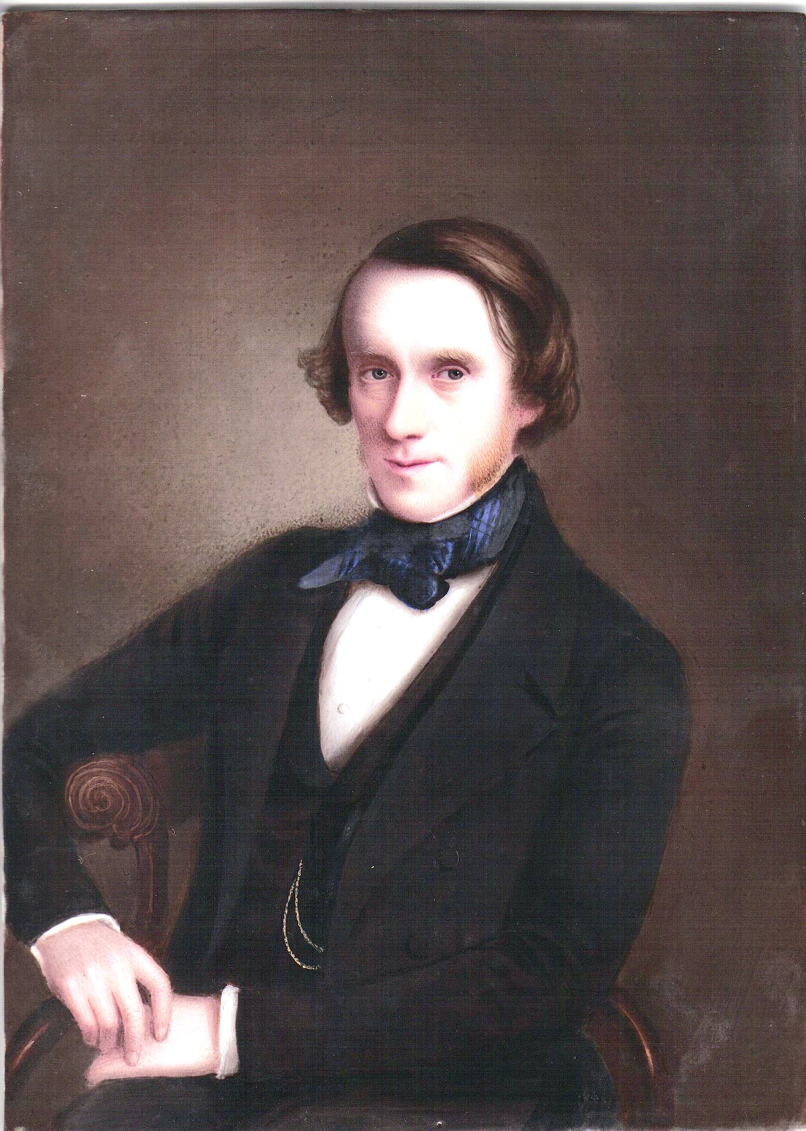 a portrait of a gentleman in a dark suit