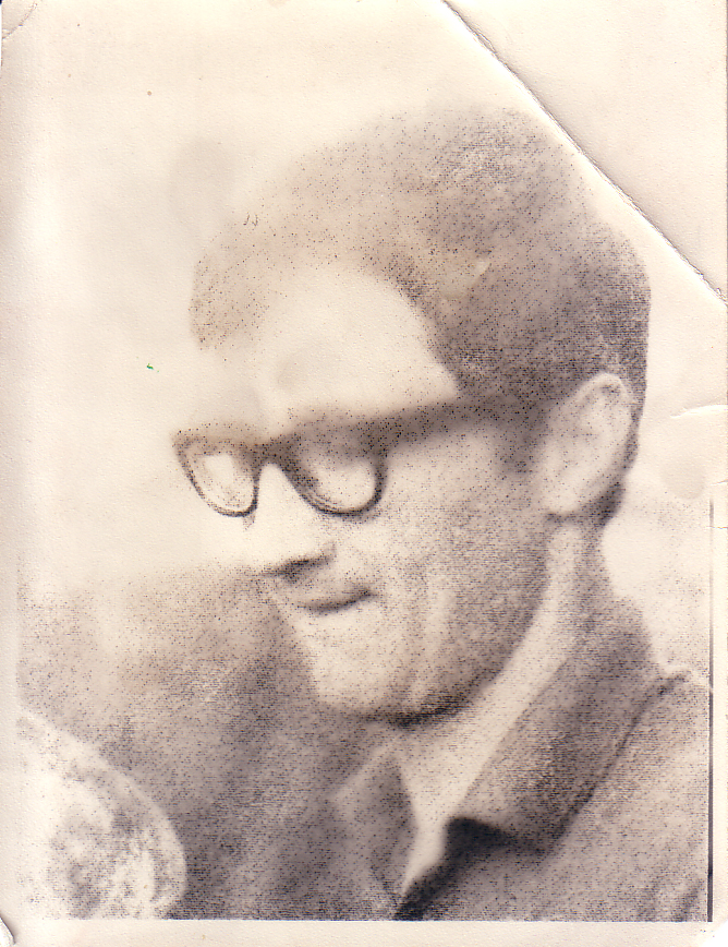 an old black and white pograph of a man