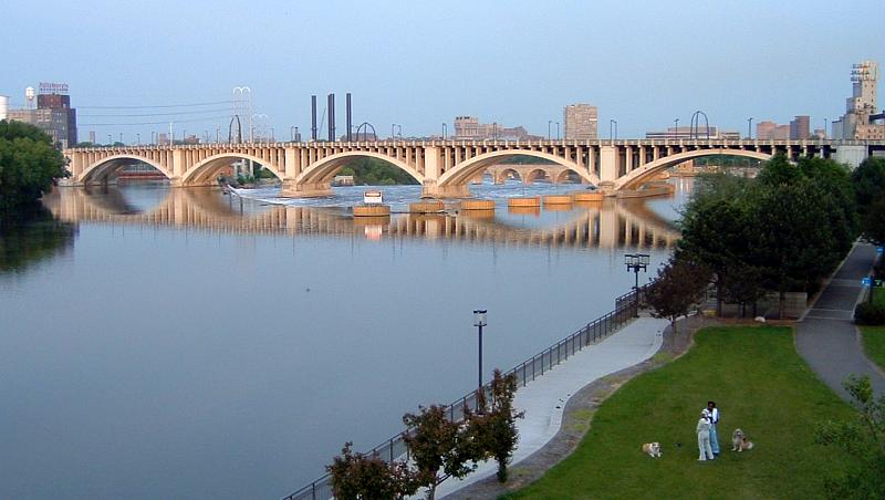 a very big nice bridge over some pretty river