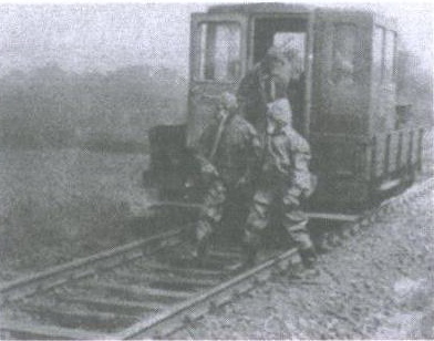 the soldiers are exiting the old train for the next trip