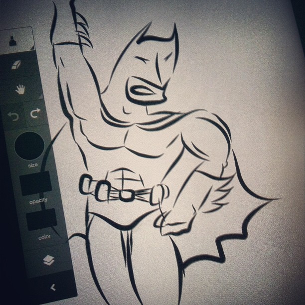 a graphic of a batman on the screen of an iphone