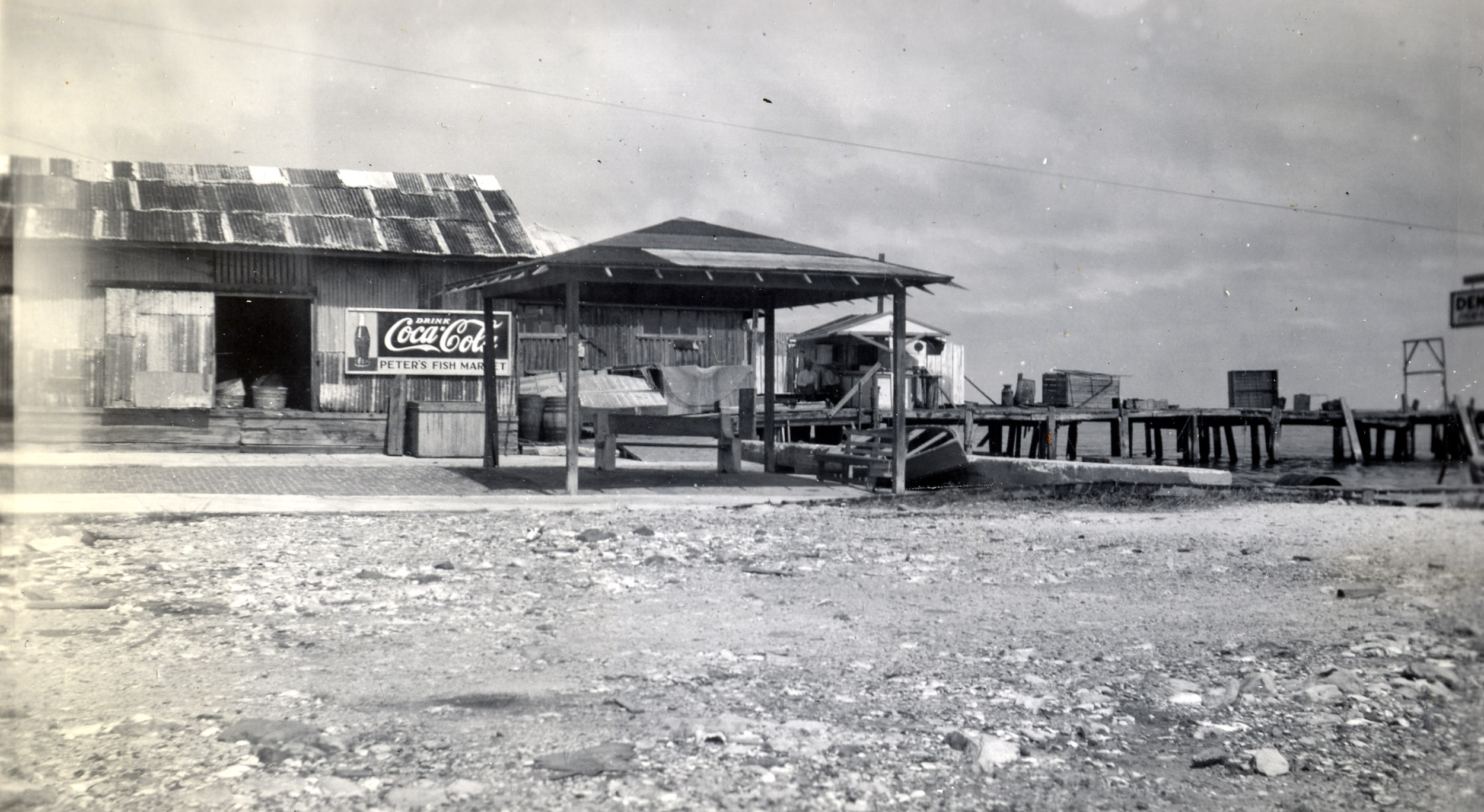 an old po of a gas station in the country