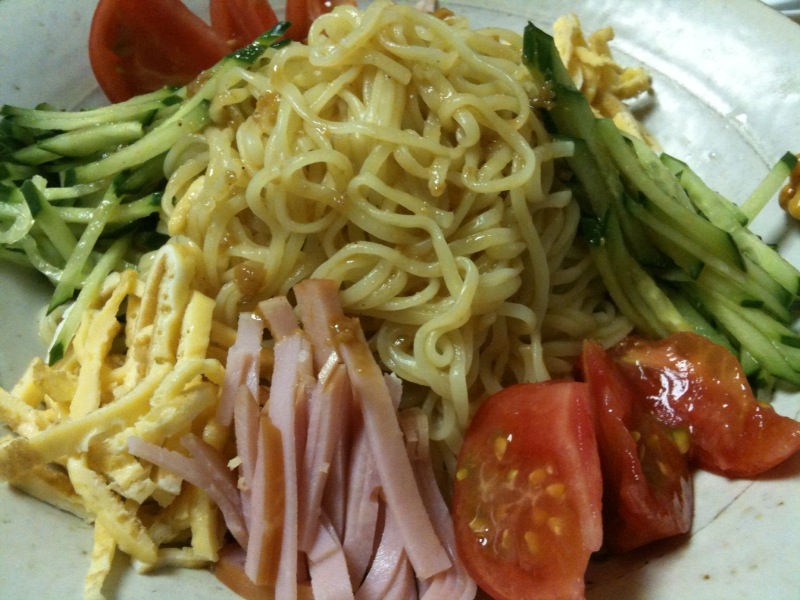 the plate is full of pasta and vegetables