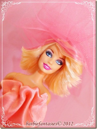 this is a beautiful barbie with pink hair
