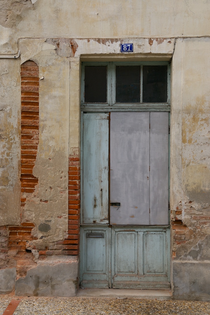 there is a blue door with a white frame