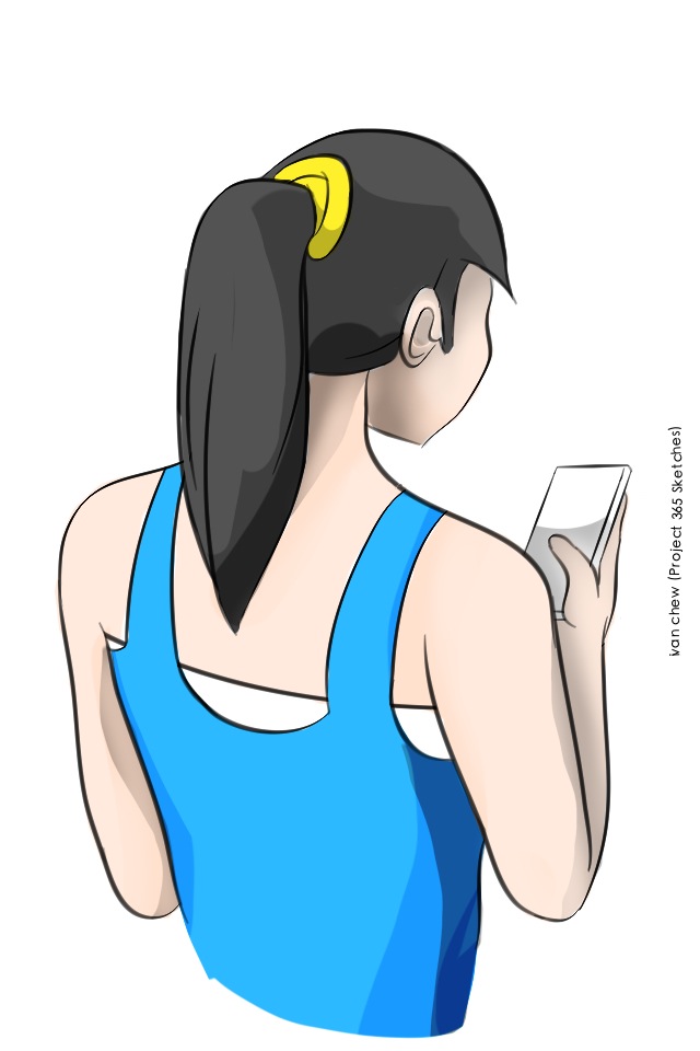 an image of a woman looking at her cell phone