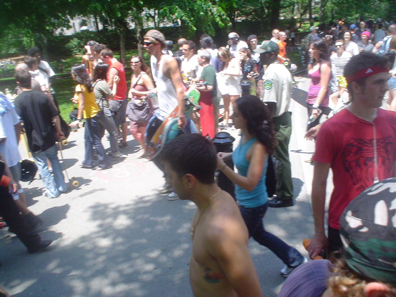 a crowd of people gathered in the street