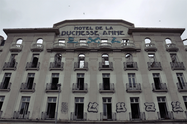 a large building with graffiti on the front
