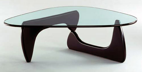a glass table with a bent wooden base