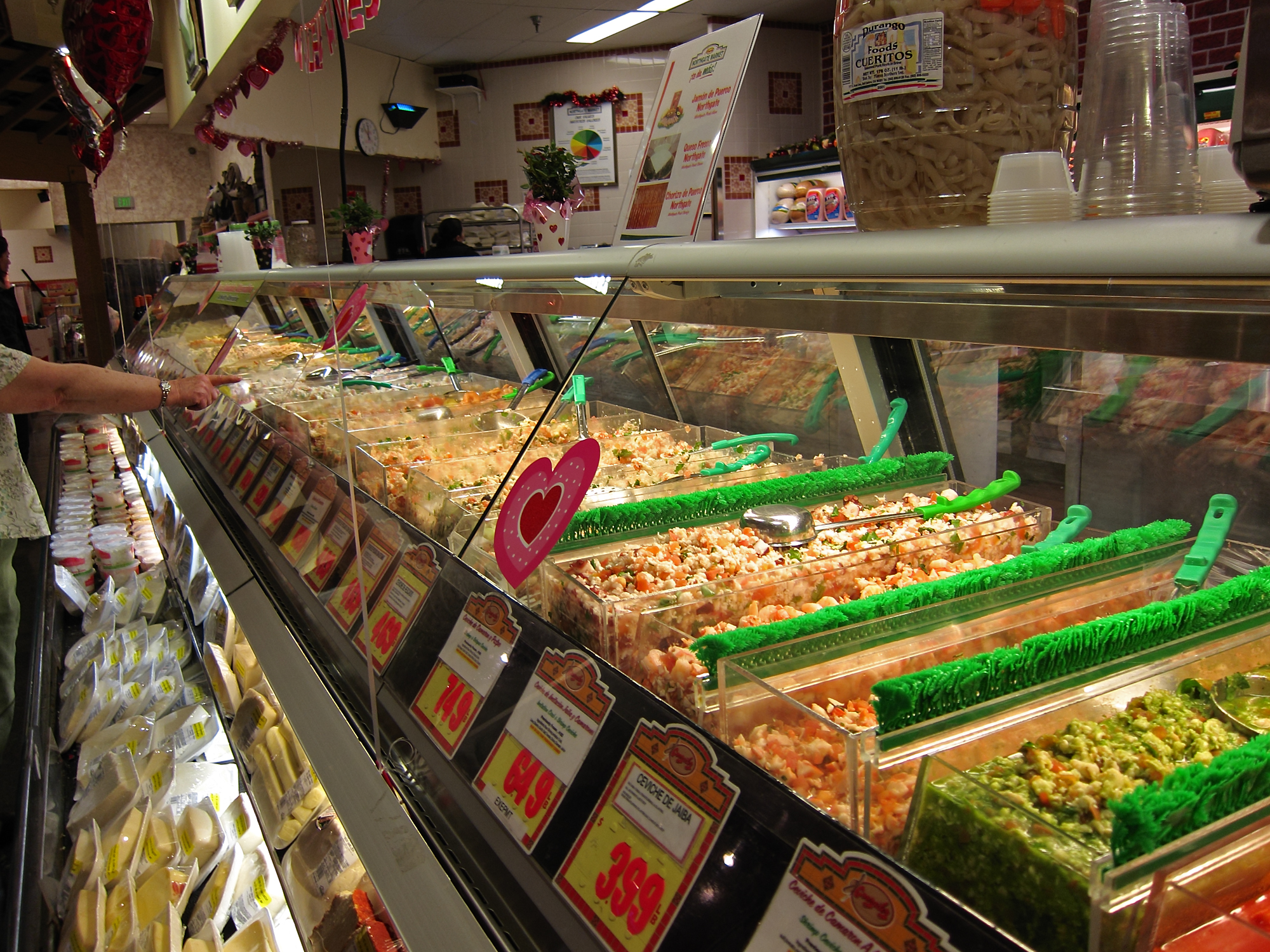 some food on a shelf behind a glass