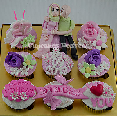 cupcakes decorated with flowers, hearts and love words