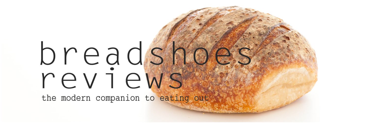 the bread shoe is sitting on a white background