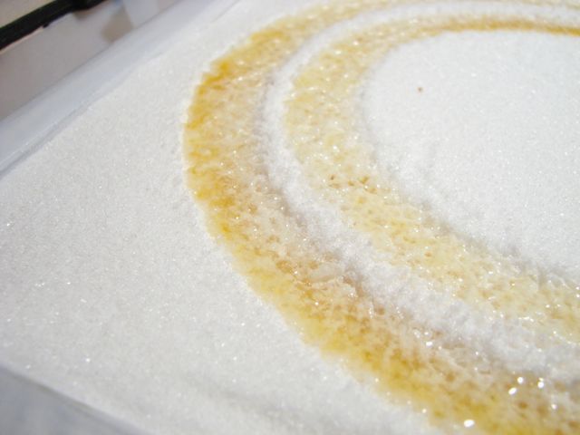 a close up view of a circular piece of material made of sugar