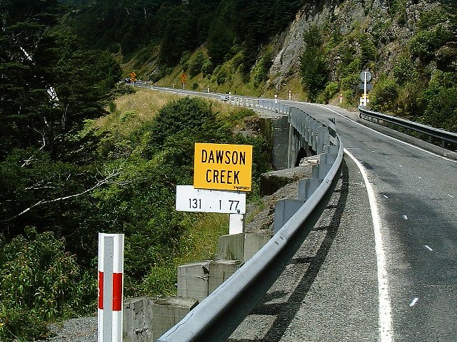 a sign warning motorists of danger on a highway
