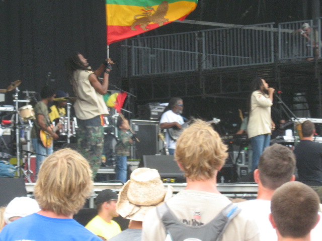 a crowd watching a band play on stage