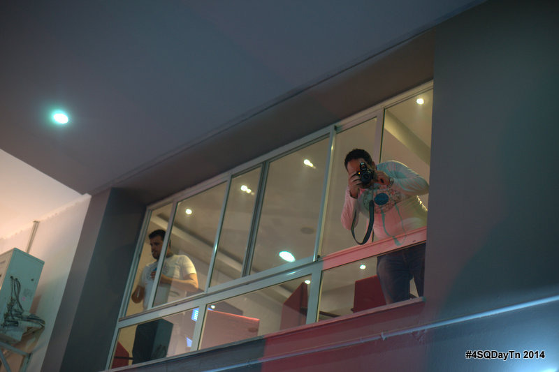 a woman taking a picture of herself and the window