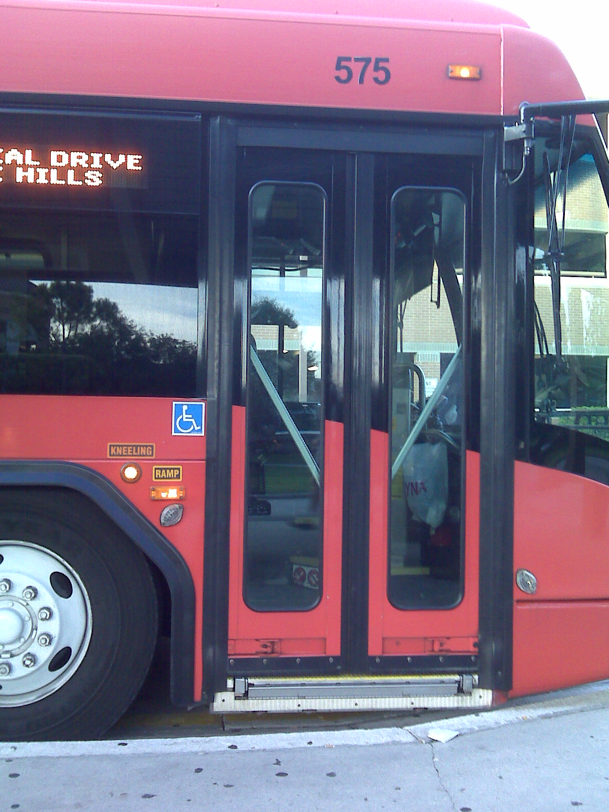 a city bus sits in front of the doors