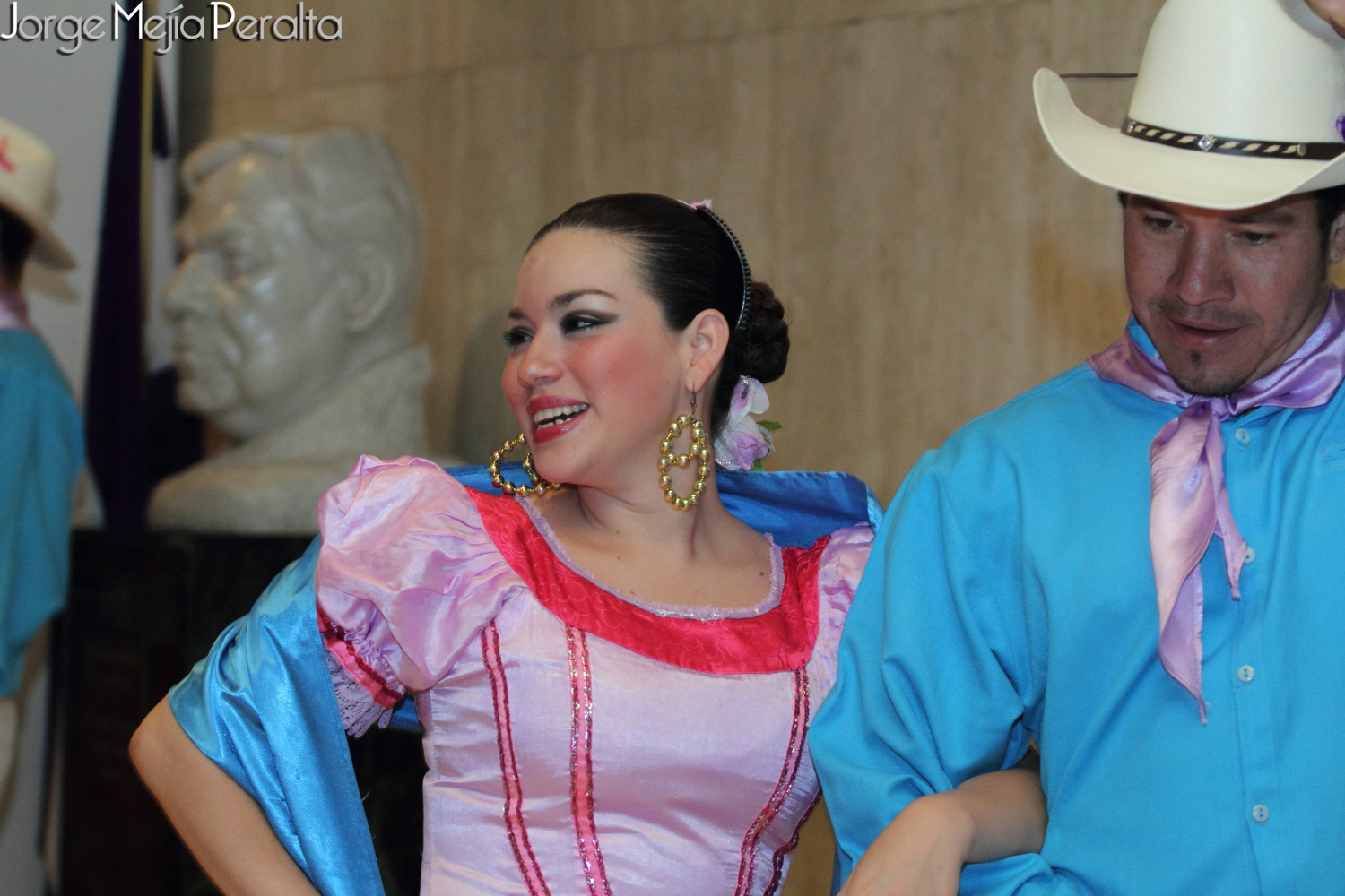 two people dressed up for a show